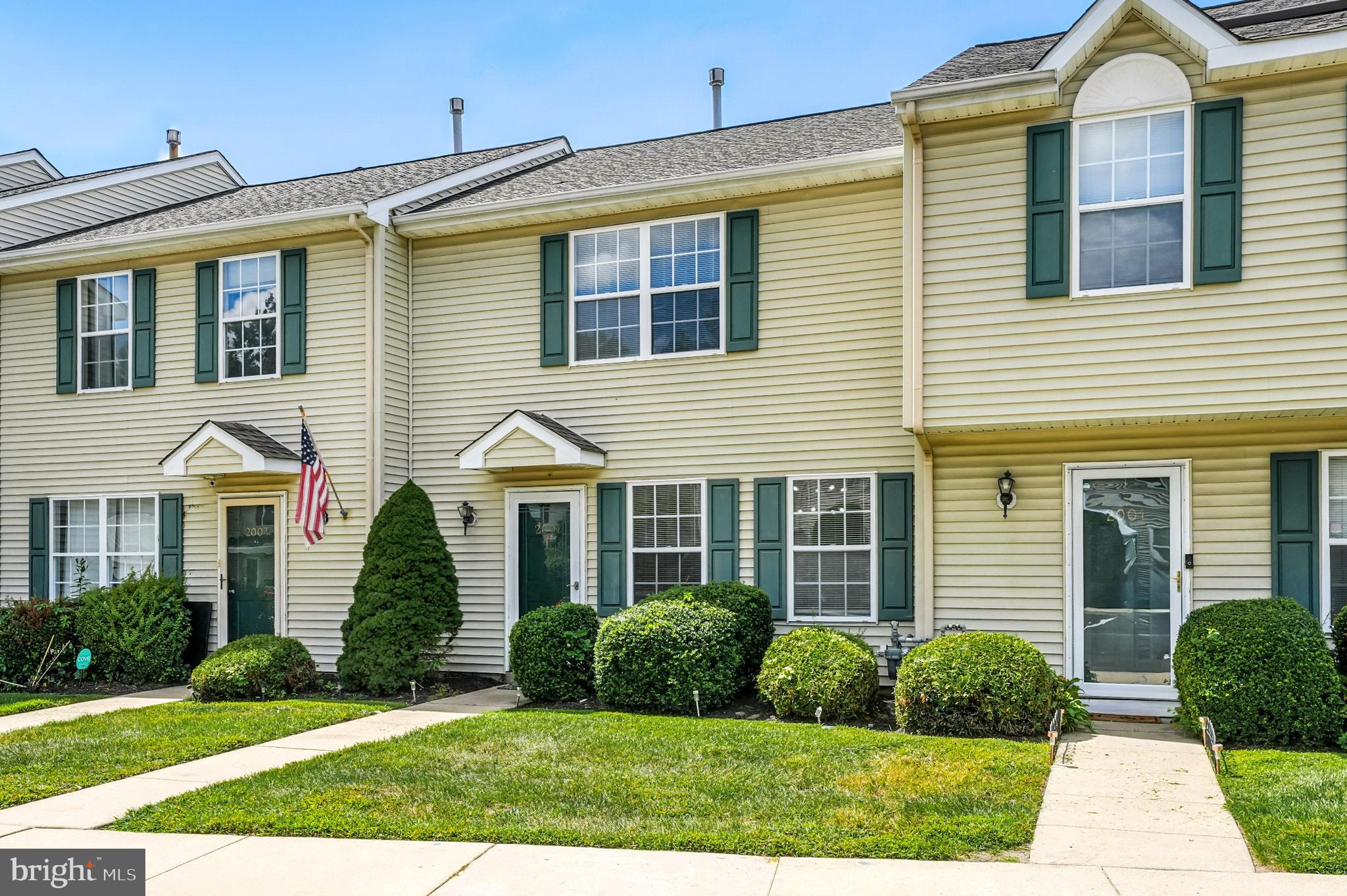 2002 Tall Pines Pine Hill, NJ 08021 - Photo 2 of 31 a front view of a house with a yard