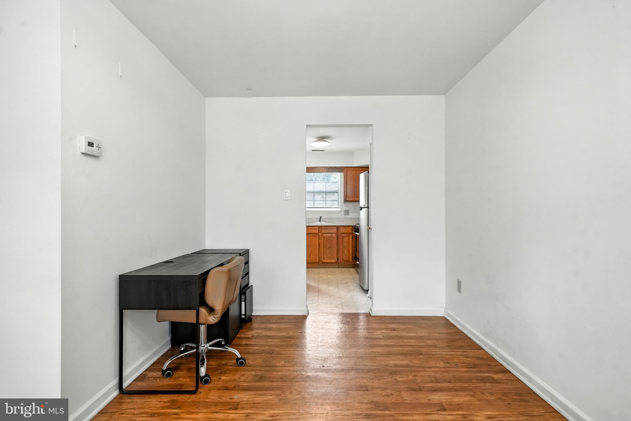 2002 Tall Pines Pine Hill, NJ 08021 - Photo 8 of 31 a workspace with furniture and wooden floor
