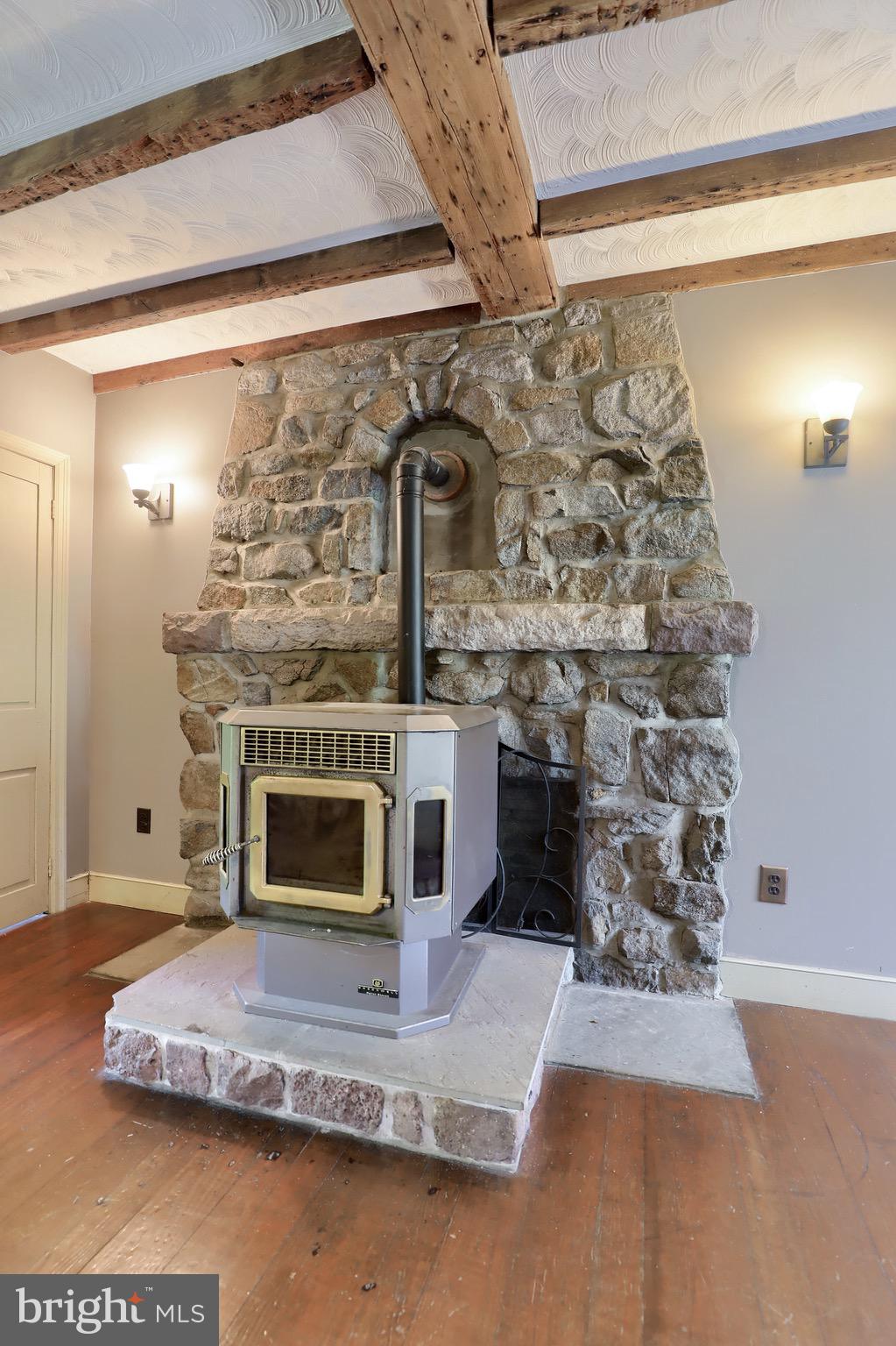 1252 Cocalico Road Birdsboro, PA 19508 - Photo 11 of 66 Living room pellet stove