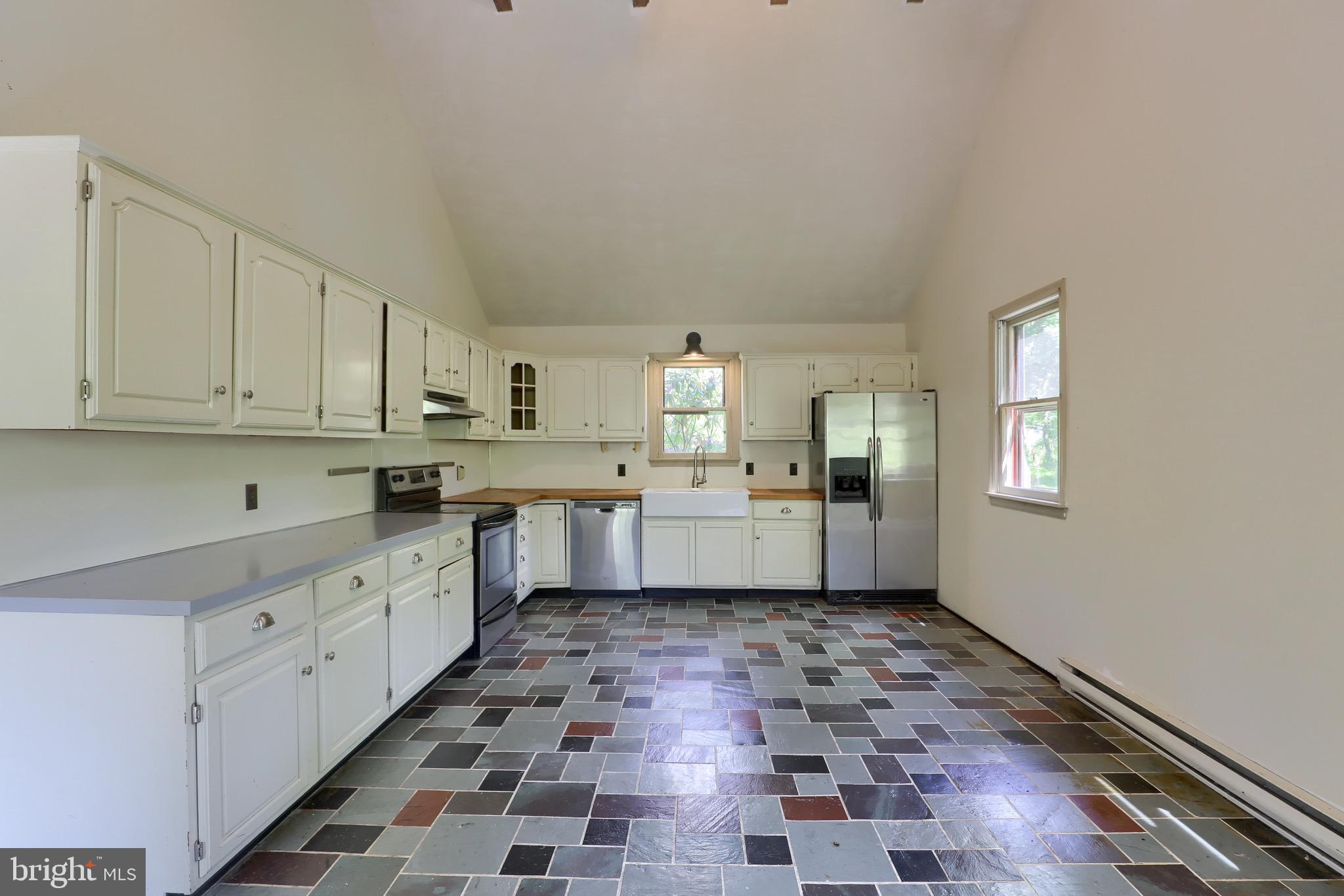 1252 Cocalico Road Birdsboro, PA 19508 - Photo 16 of 66 Kitchen flagstone floors