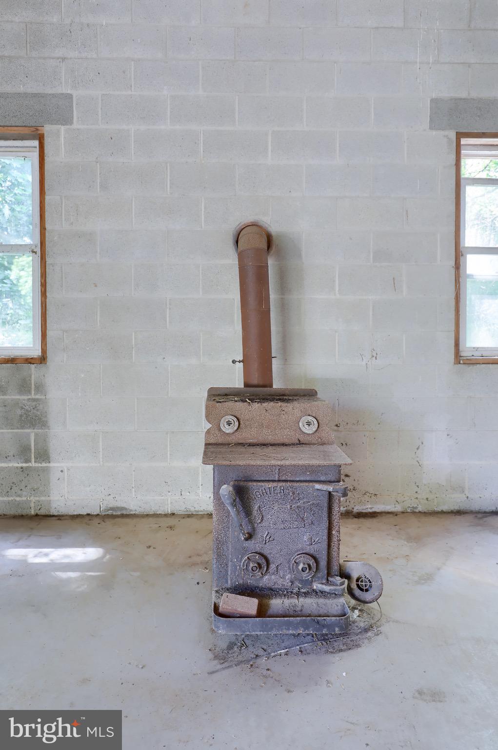 1252 Cocalico Road Birdsboro, PA 19508 - Photo 35 of 66 3 car garage wood stove