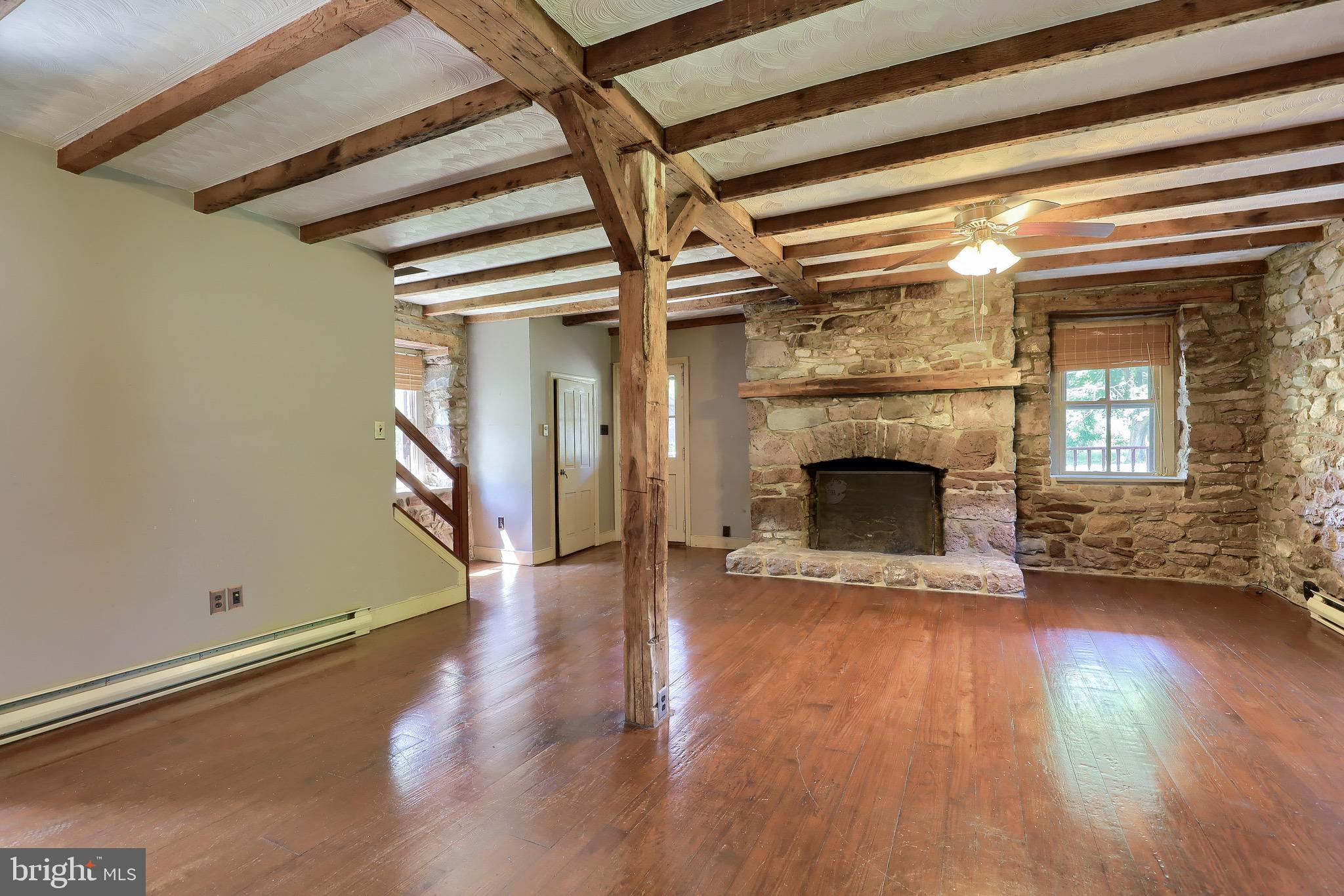 1252 Cocalico Road Birdsboro, PA 19508 - Photo 7 of 66 Living room exposed beams