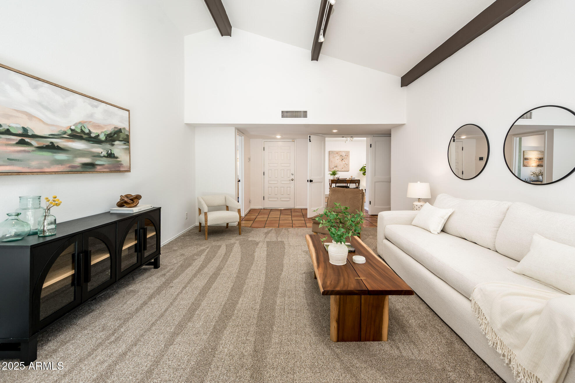 1224 East Rancho Drive Phoenix, AZ 85014 - Photo 13 of 38 a living room with furniture and a large window