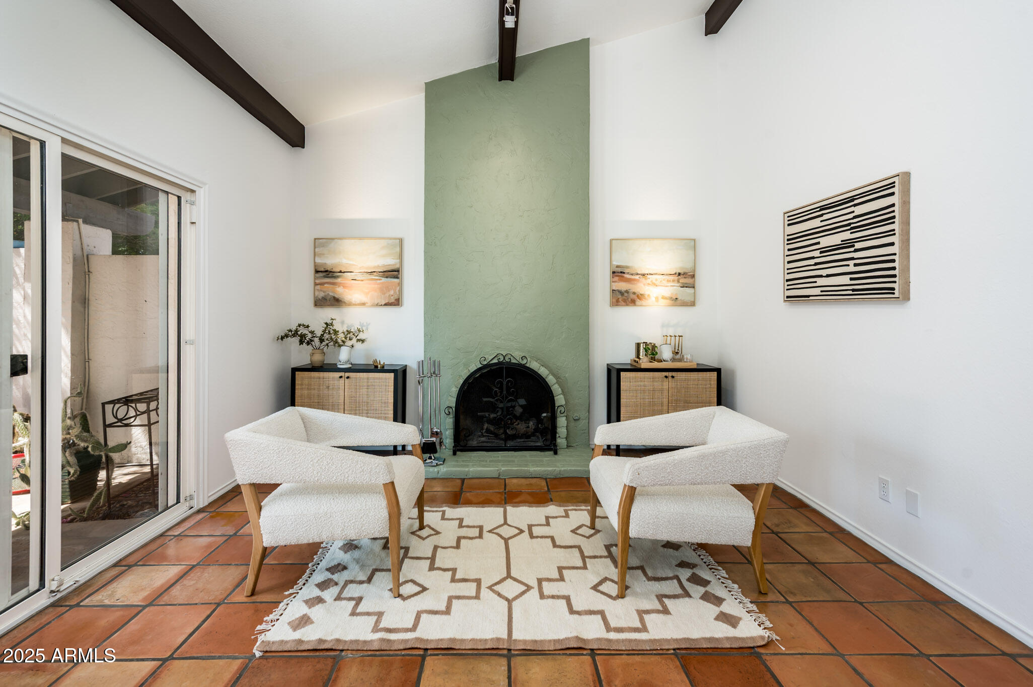 1224 East Rancho Drive Phoenix, AZ 85014 - Photo 2 of 38 a living room with furniture a rug and a toilet