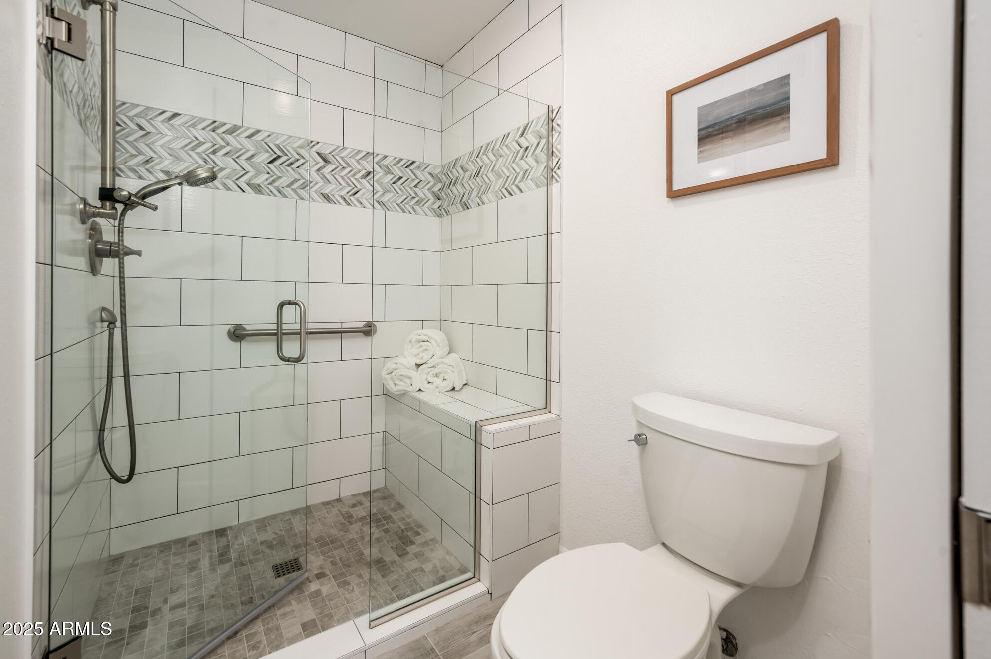 1224 East Rancho Drive Phoenix, AZ 85014 - Photo 24 of 38 a white toilet sitting next to a bathroom