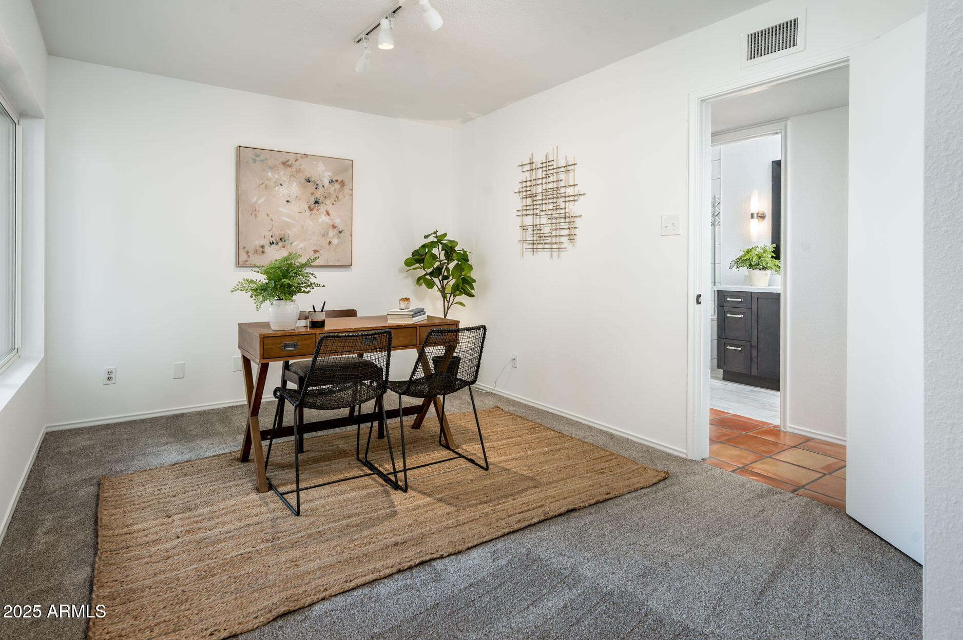 1224 East Rancho Drive Phoenix, AZ 85014 - Photo 31 of 38 a workspace with furniture and window