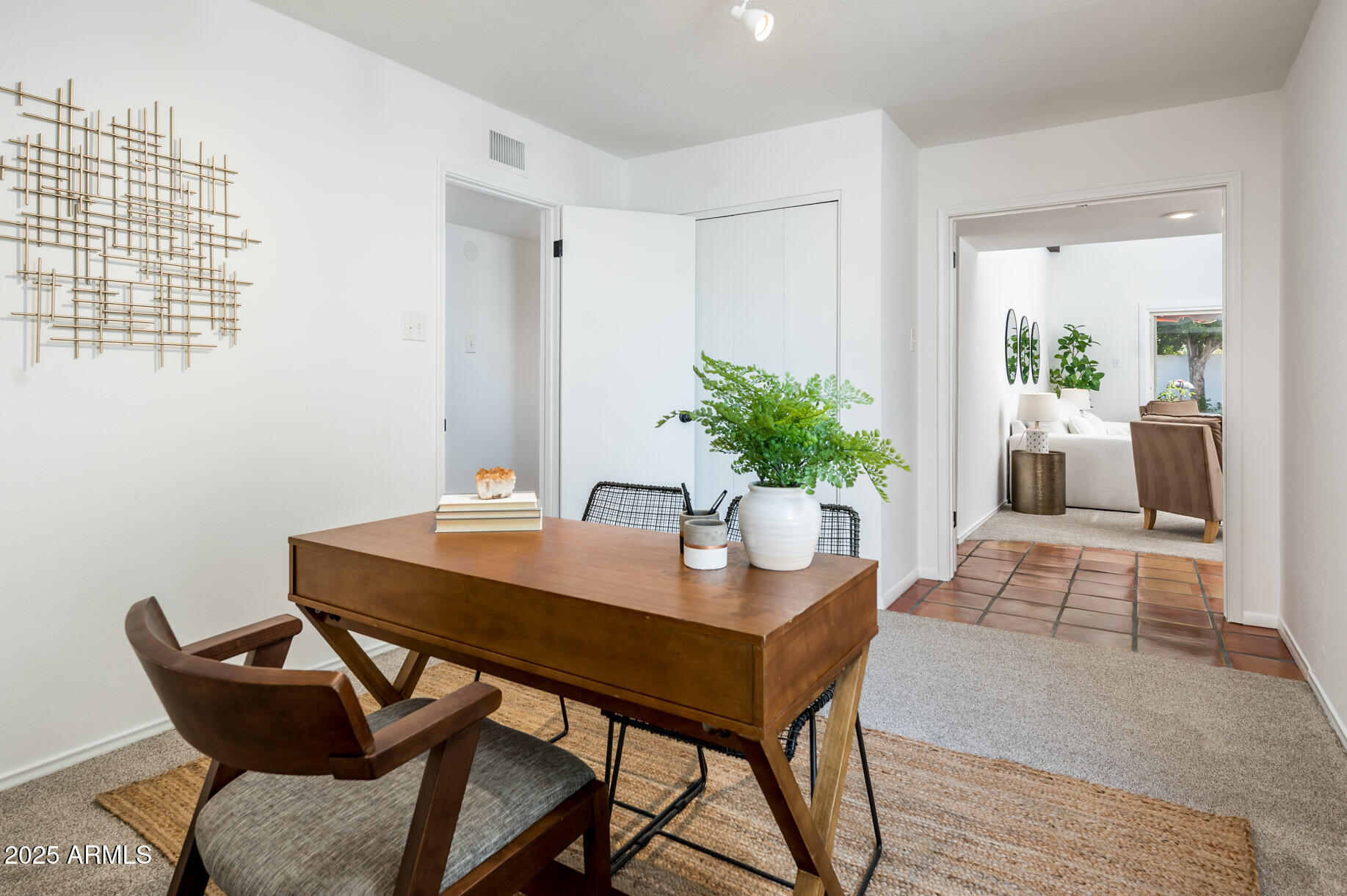 1224 East Rancho Drive Phoenix, AZ 85014 - Photo 32 of 38 a dining room with furniture and wooden floor