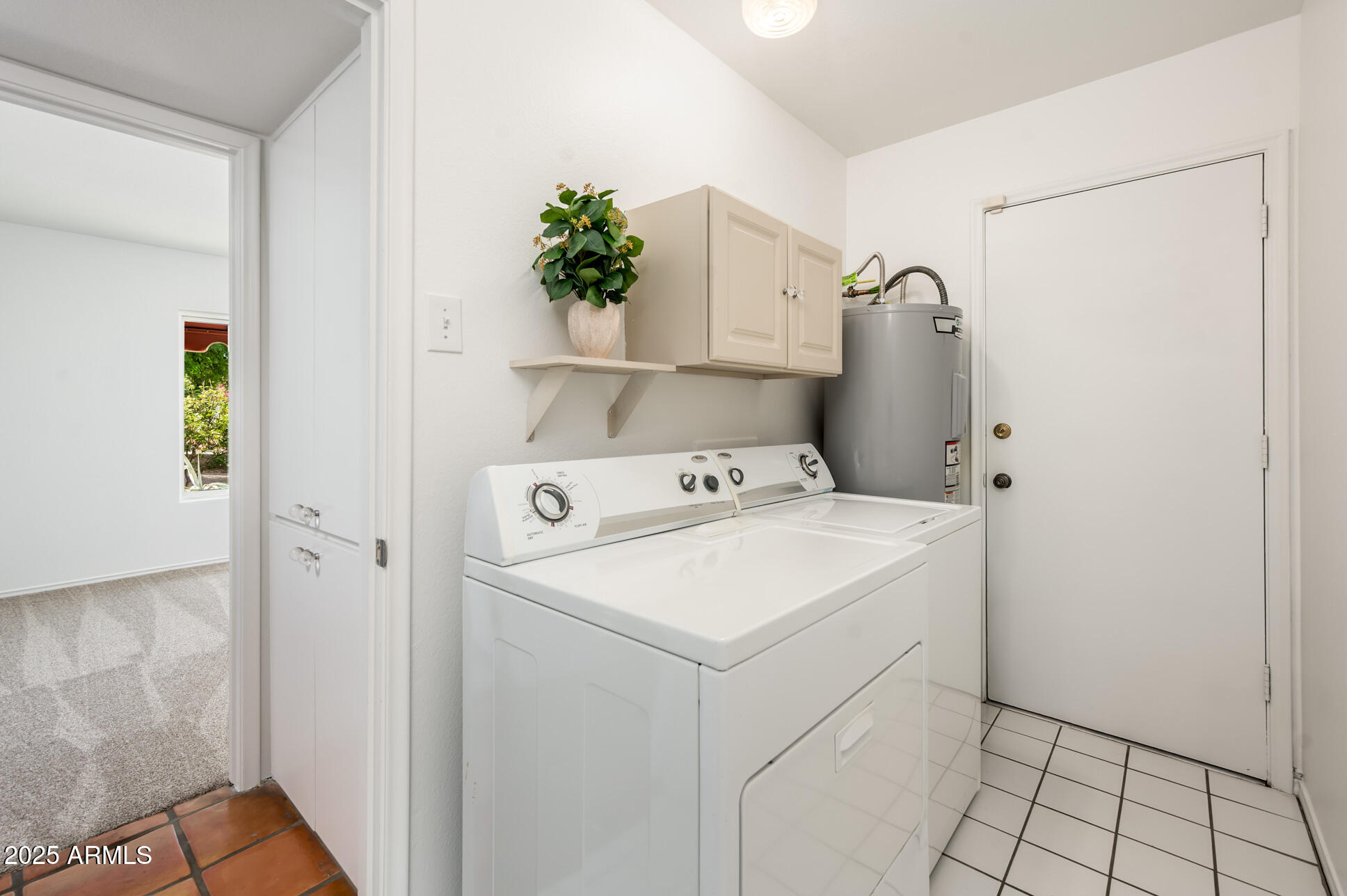 1224 East Rancho Drive Phoenix, AZ 85014 - Photo 33 of 38 a utility room with dryer and washer