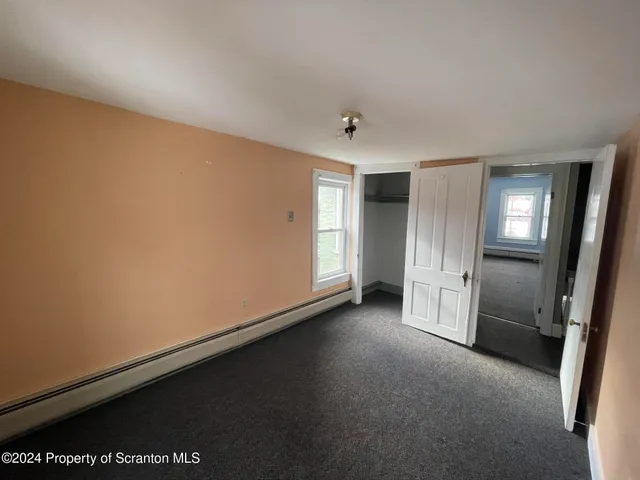 an empty room with a door