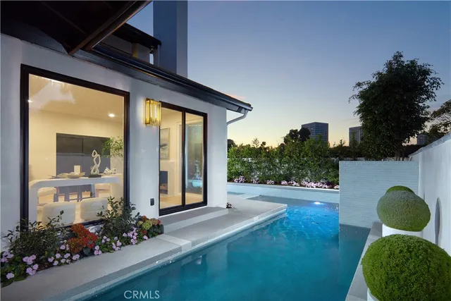 a view of a chairs and table in a yard