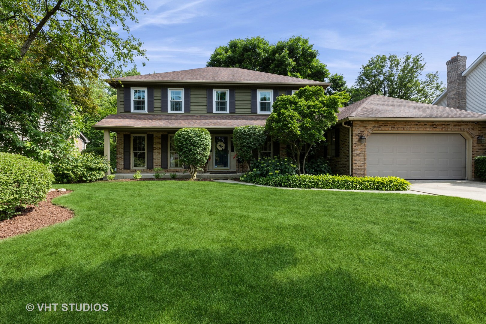 1532 Sequoia Road Naperville, IL 60540 - Photo 1 of 34 a front view of a house with a yard and trees