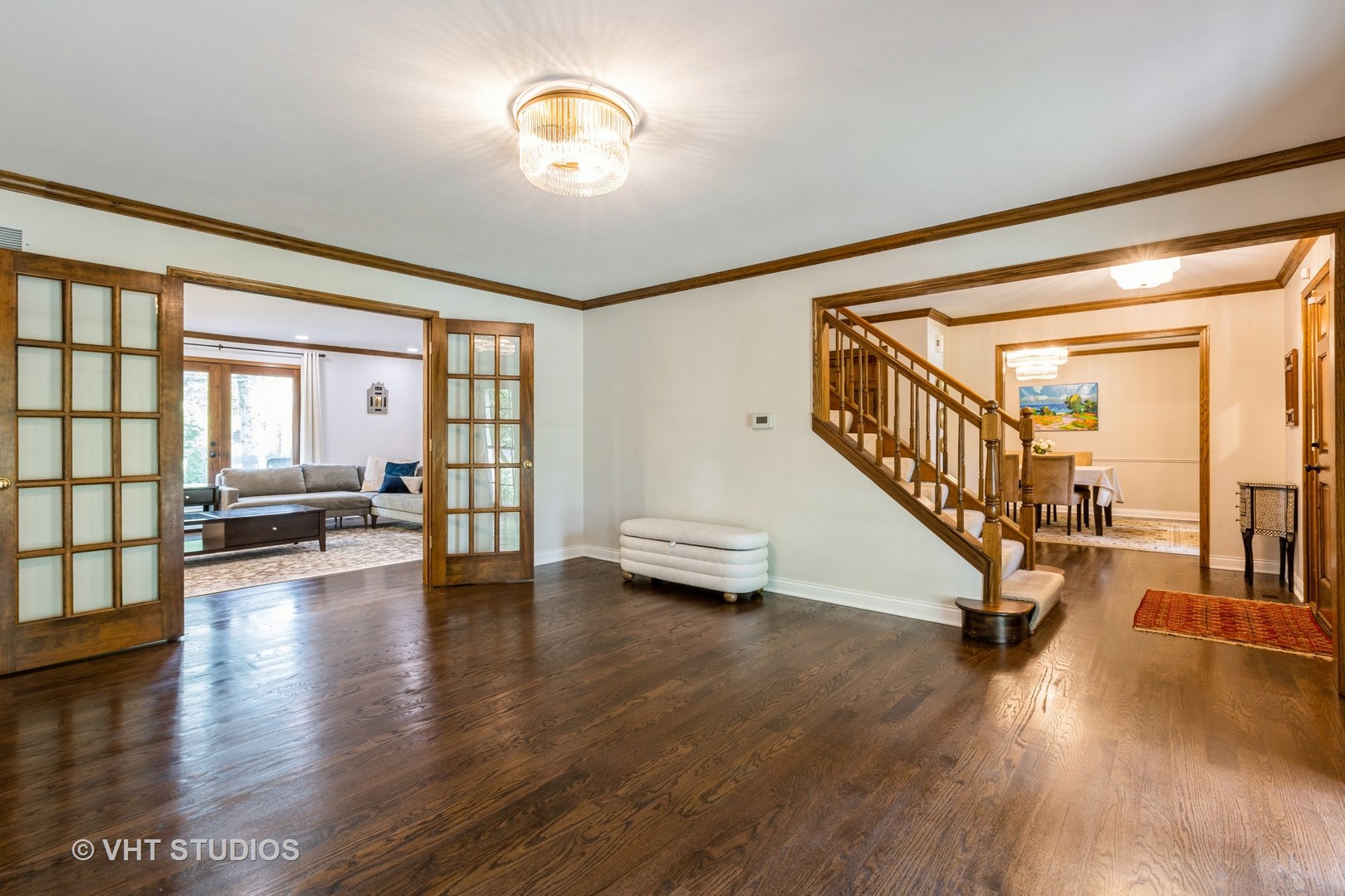1532 Sequoia Road Naperville, IL 60540 - Photo 11 of 34 a view of a livingroom with furniture hardwood floor and a ceiling fan