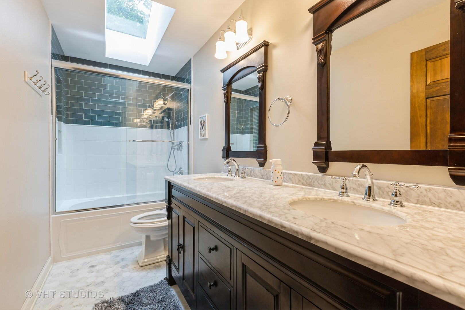 1532 Sequoia Road Naperville, IL 60540 - Photo 15 of 34 a bathroom with a granite countertop toilet sink and mirror