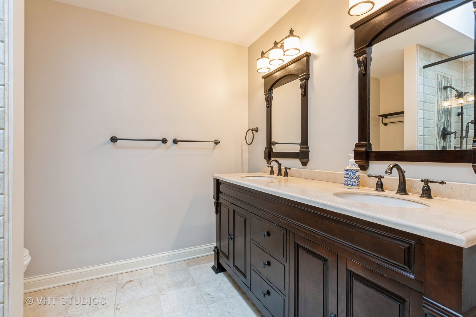 1532 Sequoia Road Naperville, IL 60540 - Photo 17 of 34 a bathroom with a double vanity sink and a mirror