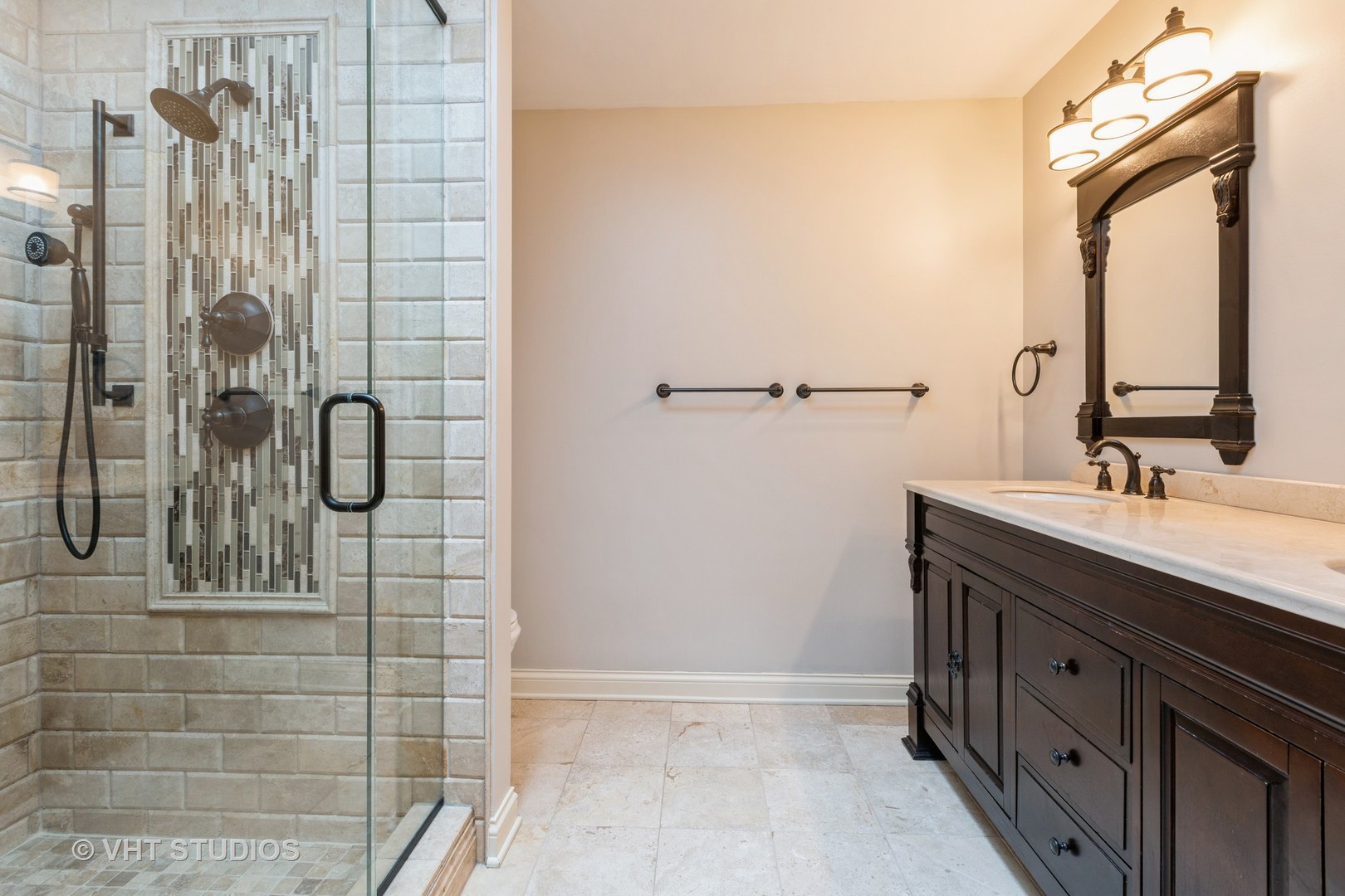 1532 Sequoia Road Naperville, IL 60540 - Photo 18 of 34 a bathroom with a double vanity sink mirror and shower