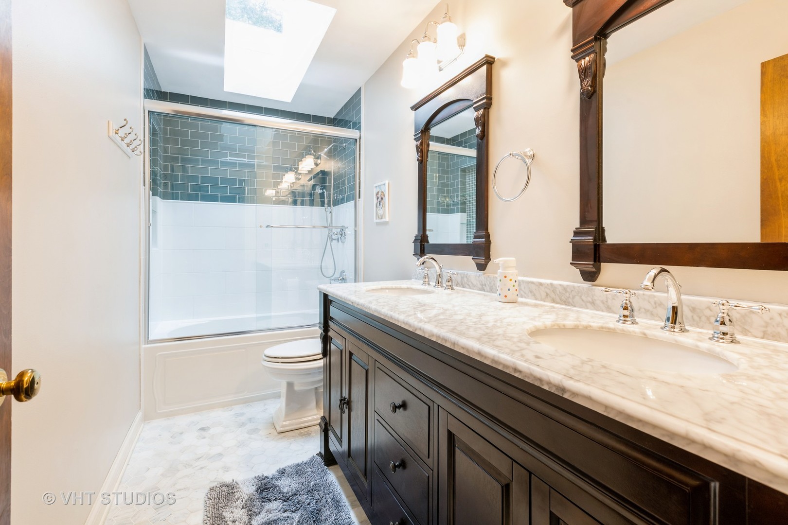 1532 Sequoia Road Naperville, IL 60540 - Photo 25 of 34 a spacious bathroom with a granite countertop sink a toilet and a mirror