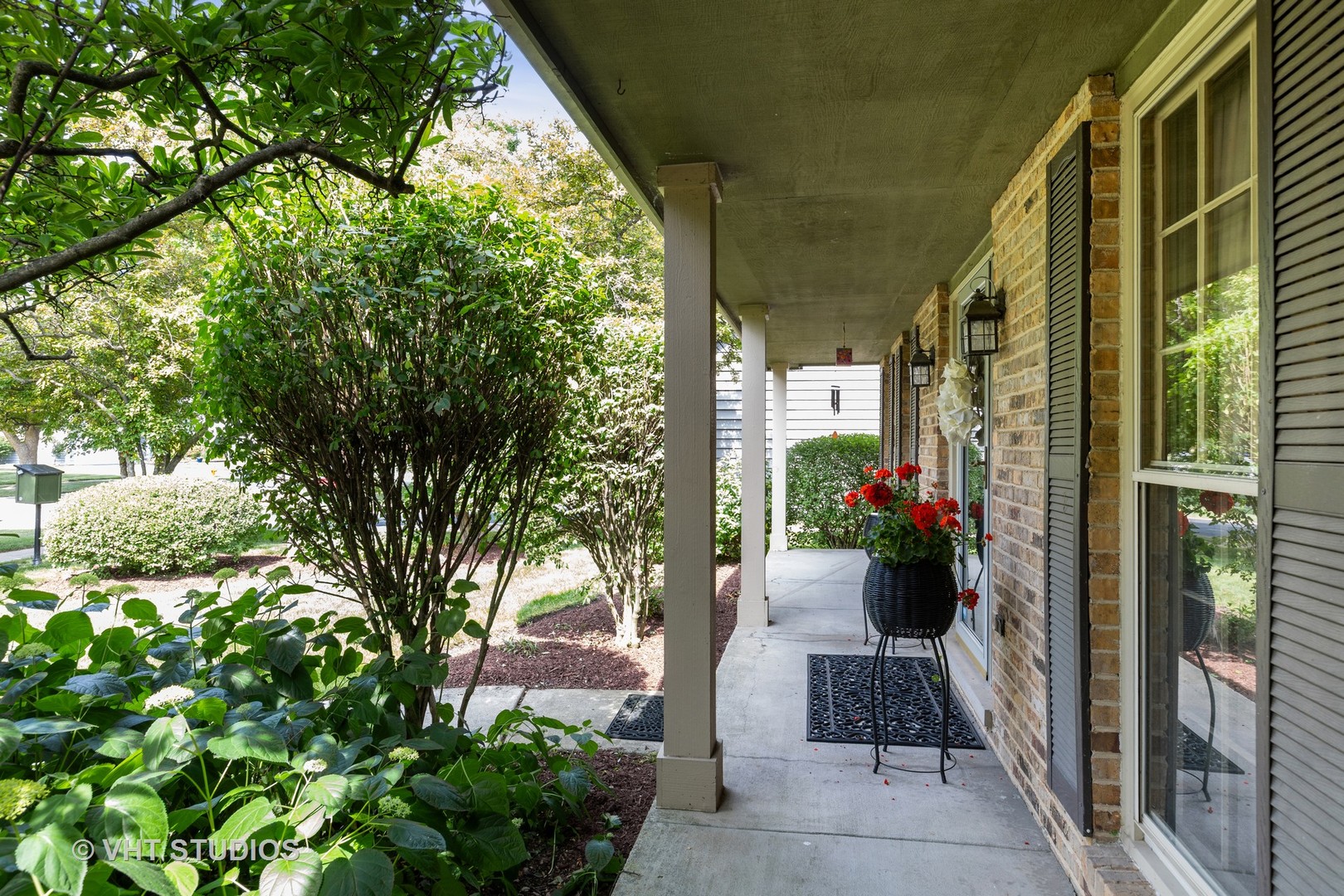 1532 Sequoia Road Naperville, IL 60540 - Photo 5 of 34 a view of a potted flower in the corridor