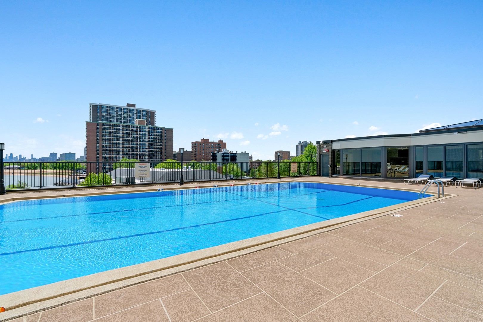 6007 North Sheridan Road, Unit 39C Chicago, IL 60660 - Photo 13 of 19 a view of an outdoor space with swimming pool