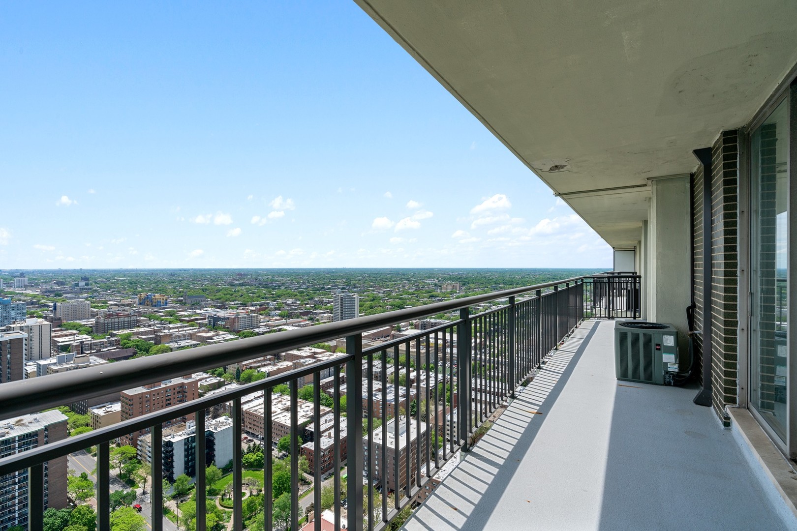 6007 North Sheridan Road, Unit 39C Chicago, IL 60660 - Photo 5 of 19 a city view from balcony