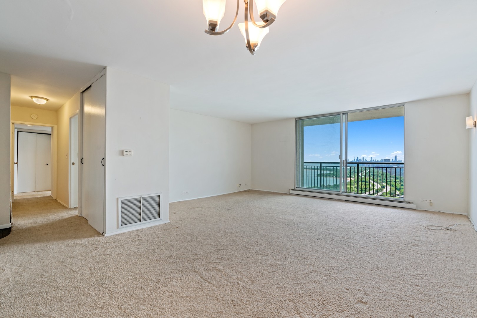 6007 North Sheridan Road, Unit 39C Chicago, IL 60660 - Photo 6 of 19 a view of a room with a large window