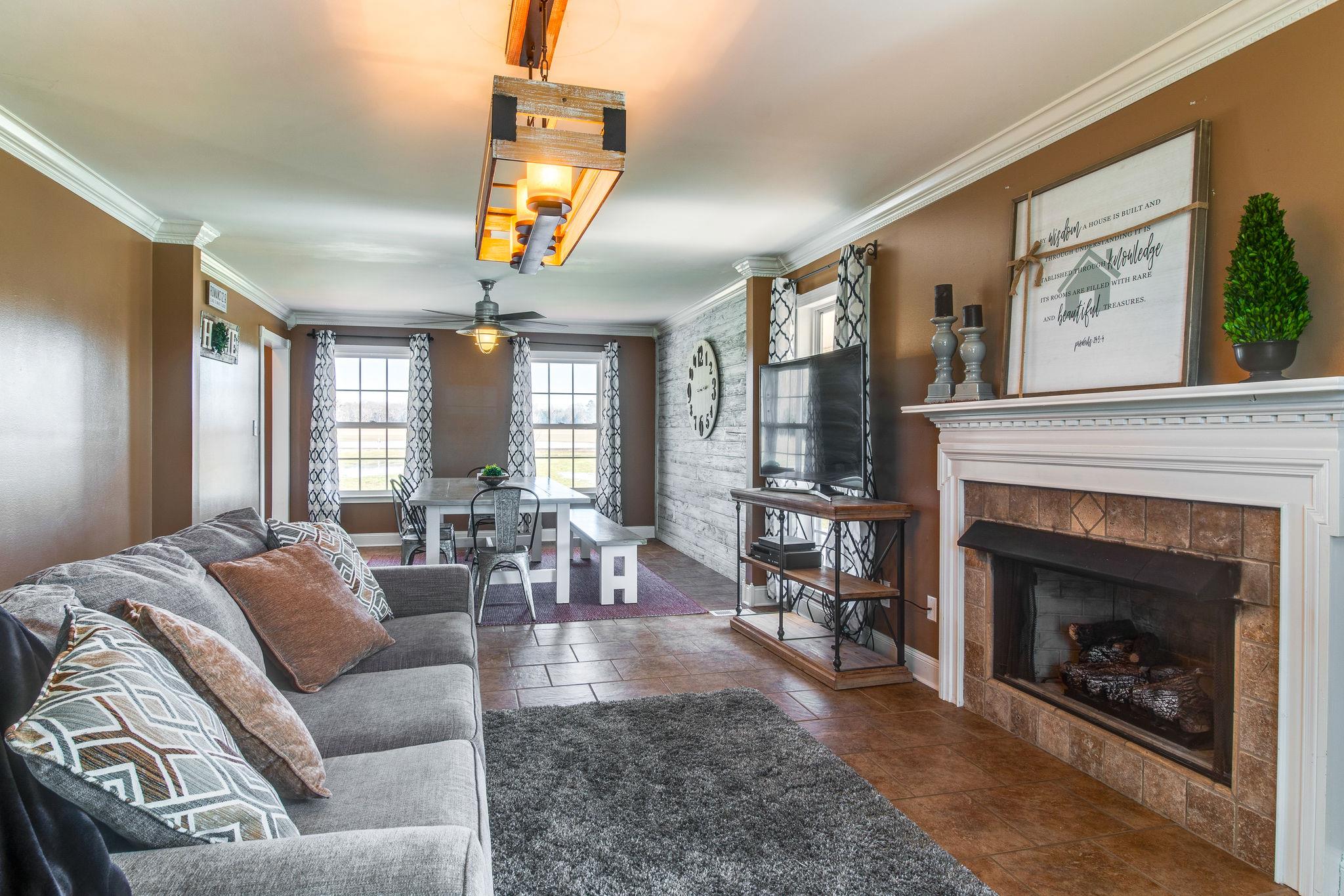 Open to the dining room and kitchen