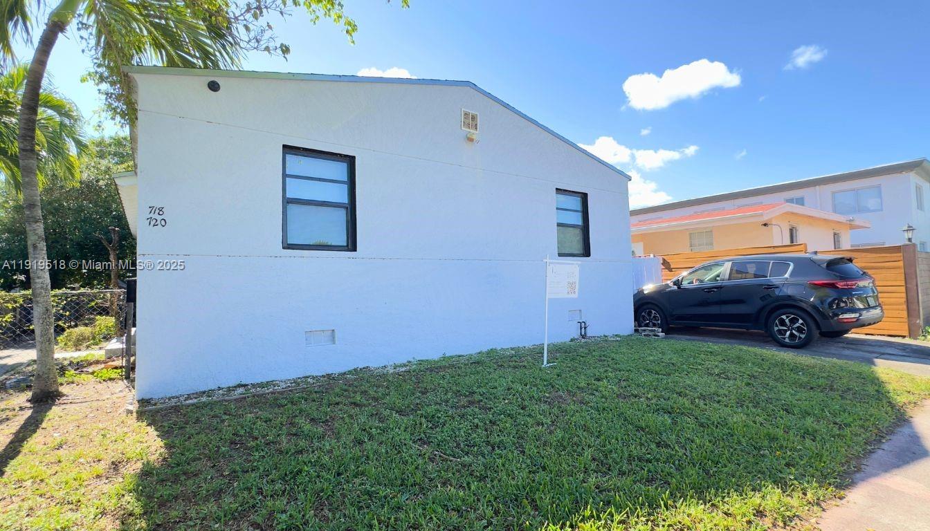 720 82nd Street, Unit 718 Miami Beach, FL 33141 - Photo 12 of 12 a view of a back yard of the house