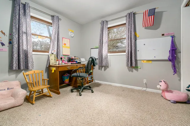 a bathroom with a sink toilet and a mirror