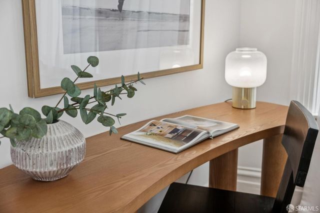 a kitchen with a sink and a stove top oven
