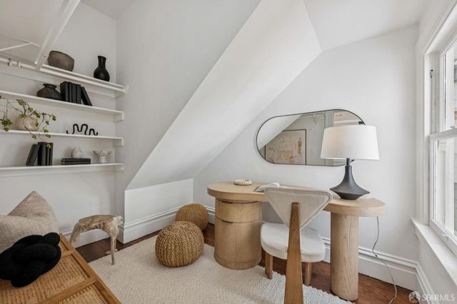 a bathroom with a sink a vanity and a mirror