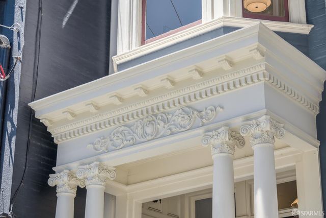 a view of dinning table and chairs in patio
