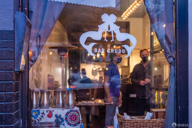 a store filled with lots of different kinds of fruit and vegetables