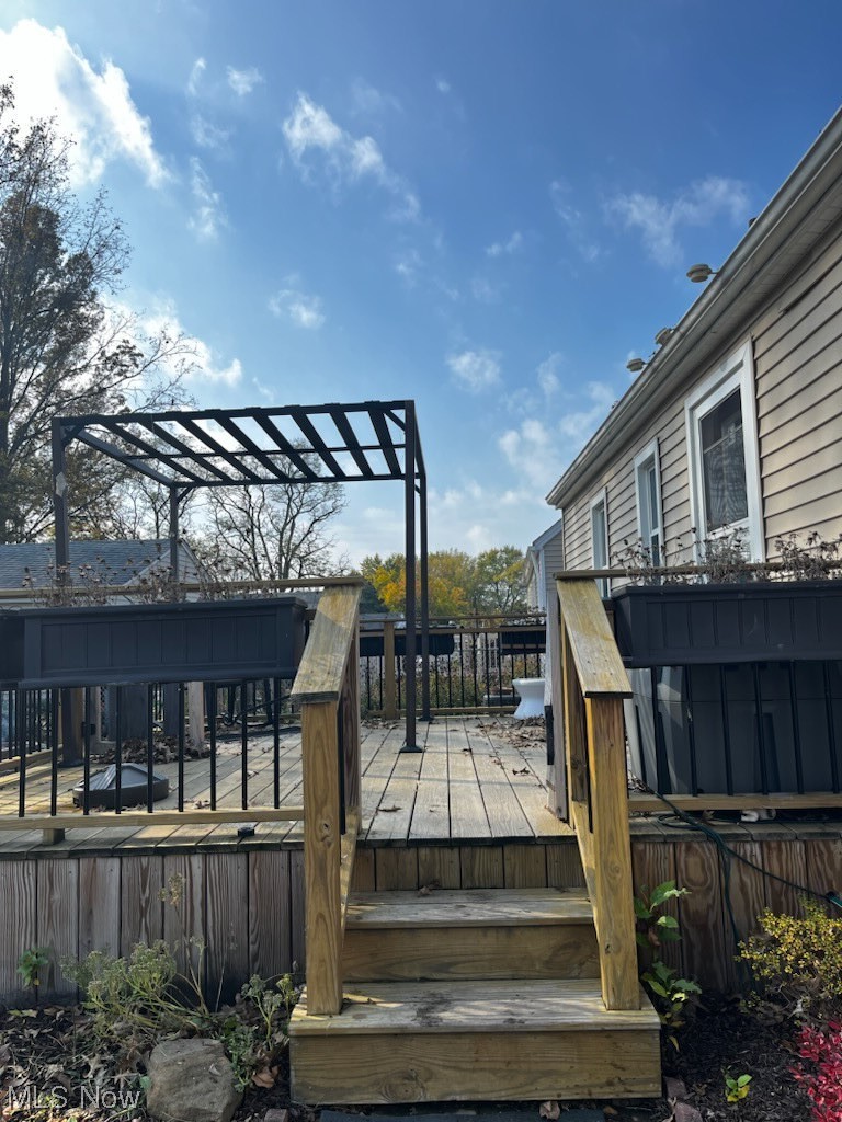 30824 Clarmont Road Willowick, OH 44095 - Photo 4 of 24 Wooden terrace featuring a pergola