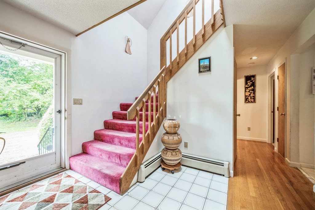 210 Ipswich Road Boxford, MA 01921 - Photo 2 of 33 a view of entryway with wooden floor and stairs
