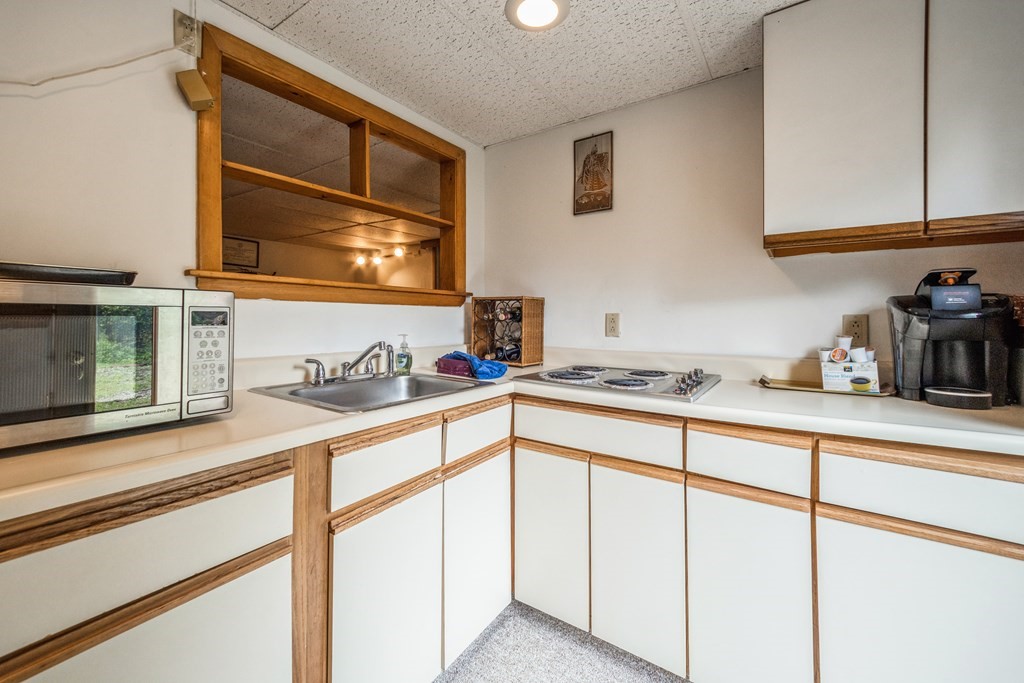 210 Ipswich Road Boxford, MA 01921 - Photo 23 of 33 a kitchen with cabinets and sink
