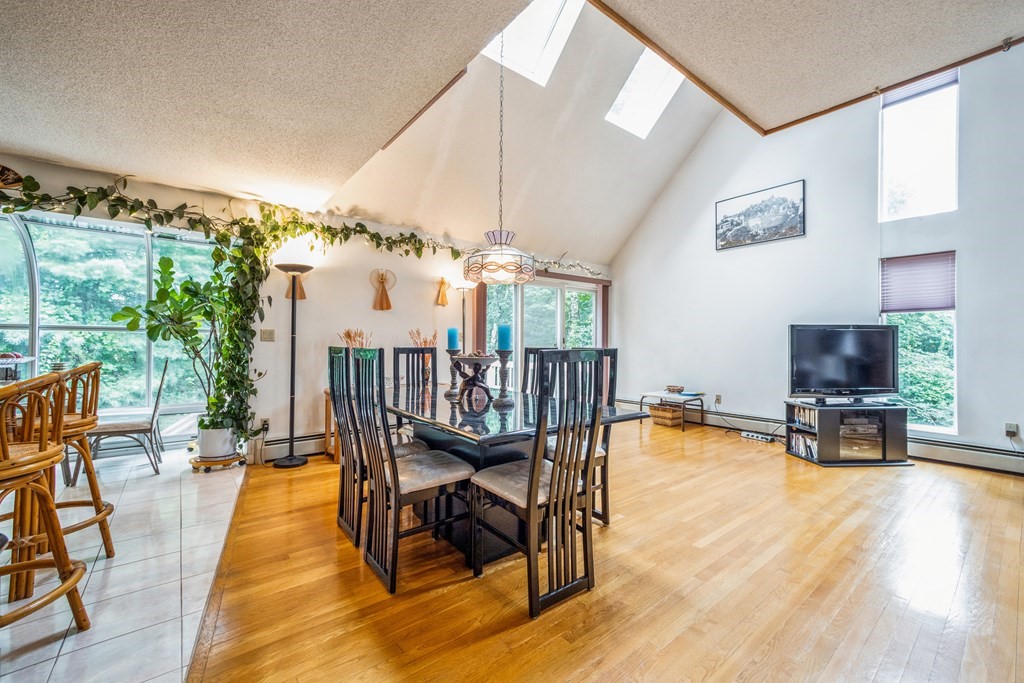 210 Ipswich Road Boxford, MA 01921 - Photo 3 of 33 a dining room with furniture and wooden floor