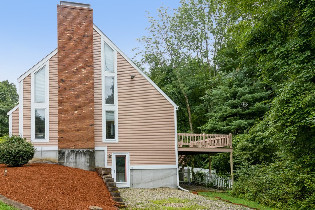 210 Ipswich Road Boxford, MA 01921 - Photo 31 of 33 a view of a house with backyard and sitting area