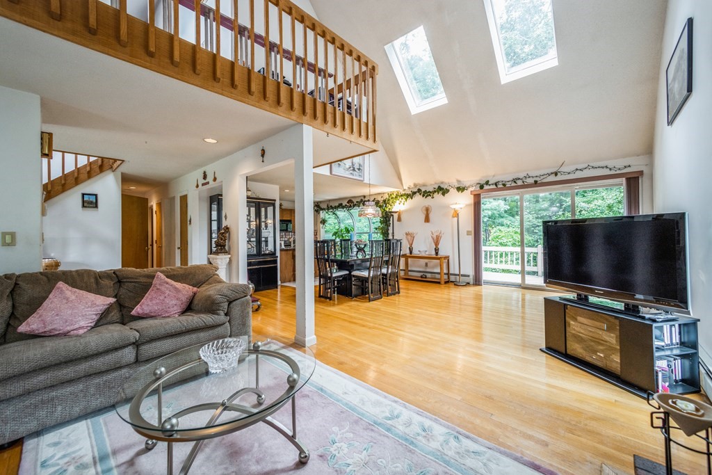 210 Ipswich Road Boxford, MA 01921 - Photo 6 of 33 a living room with furniture and a flat screen tv