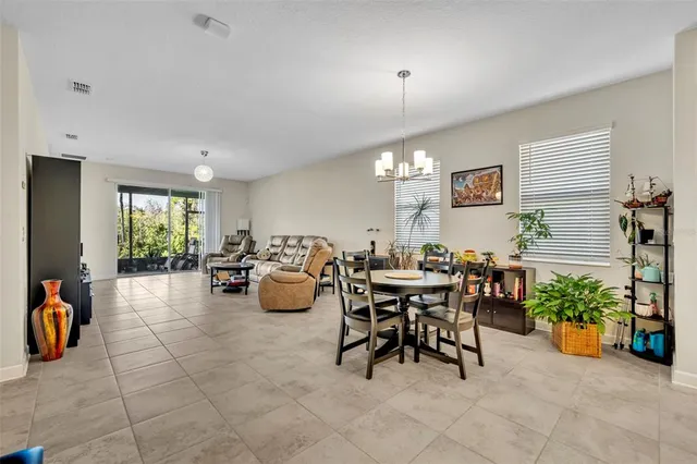 a view of a livingroom with furniture and a window