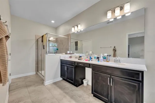 a kitchen with stainless steel appliances a sink and cabinets