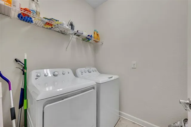 a view of a workspace with furniture and a workspace