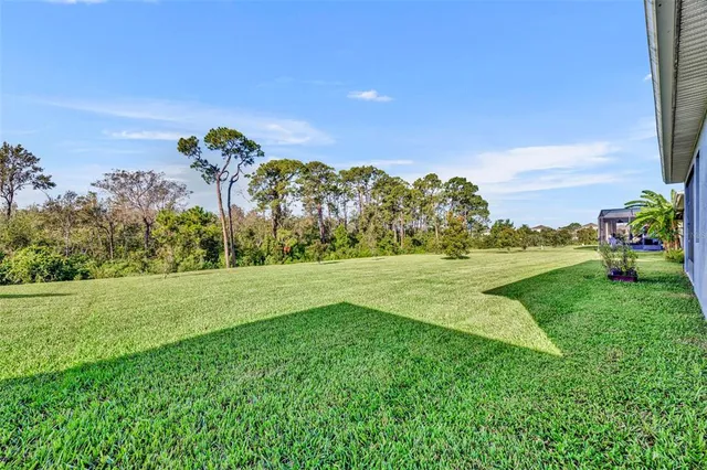 a view of swimming pool with a garden