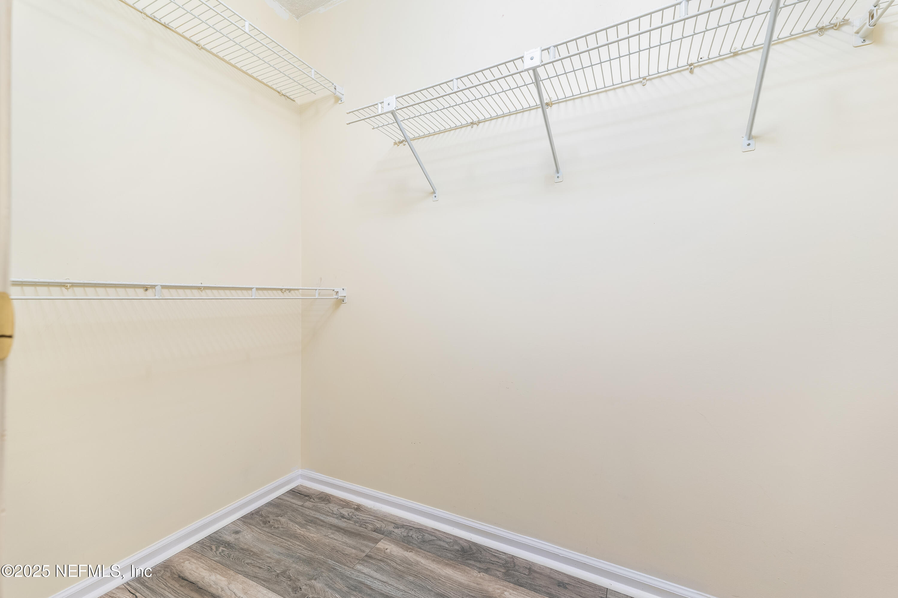 85 Debarry Avenue, Unit 3021 Orange Park, FL 32073 - Photo 21 of 35 a view of a room with racks on the wall