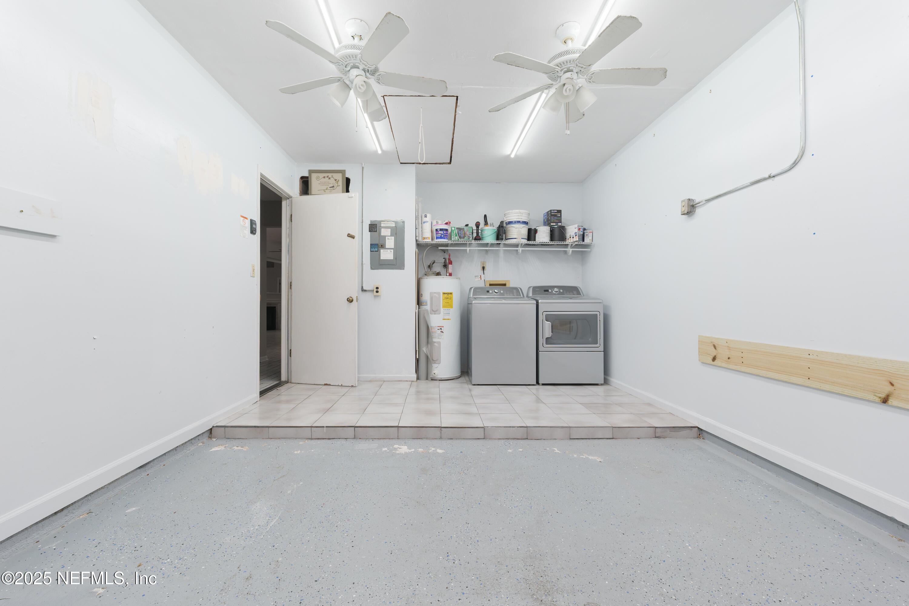 85 Debarry Avenue, Unit 3021 Orange Park, FL 32073 - Photo 30 of 35 a view of a storage & utility room with cabinets