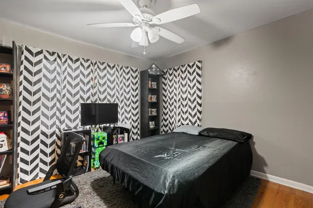 a kitchen that has a lot of cabinets in it and stainless steel appliances