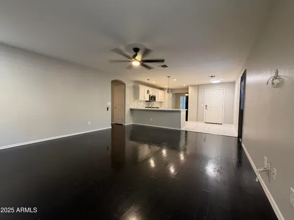 a view of a livingroom with wooden floor
