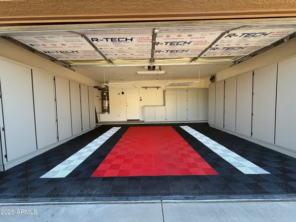 a view of an house with backyard and porch