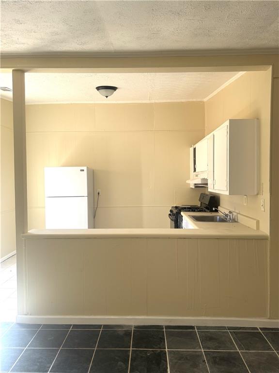 2126 Hanfred Court Tucker, GA 30084 - Photo 4 of 9 a bathroom with a bathtub and a window