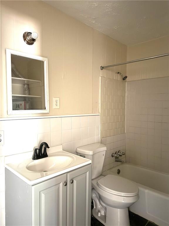 2126 Hanfred Court Tucker, GA 30084 - Photo 7 of 9 a bathroom with a sink a toilet and shower