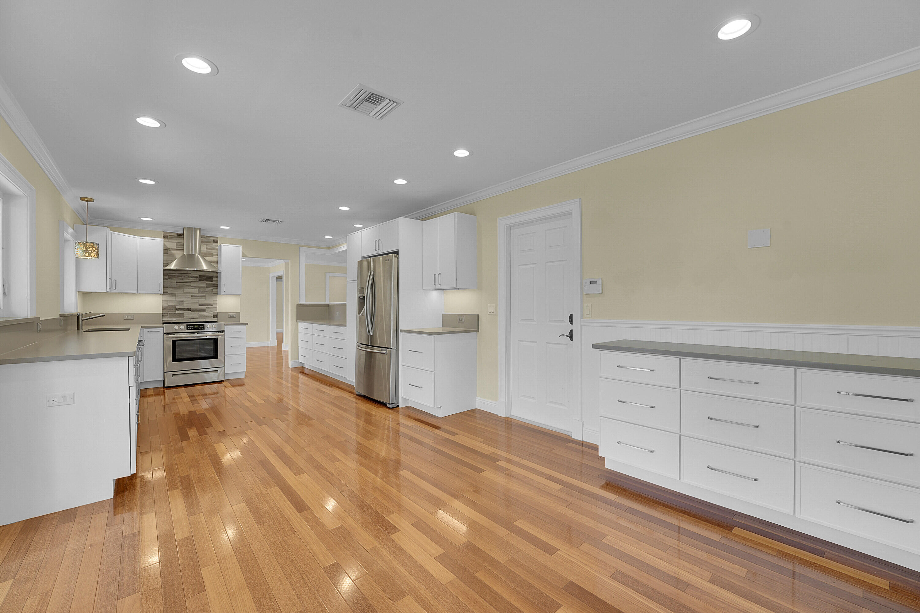 10 Middle Road Sewall's Point, FL 34996 - Photo 12 of 28 a view of kitchen with wooden floor