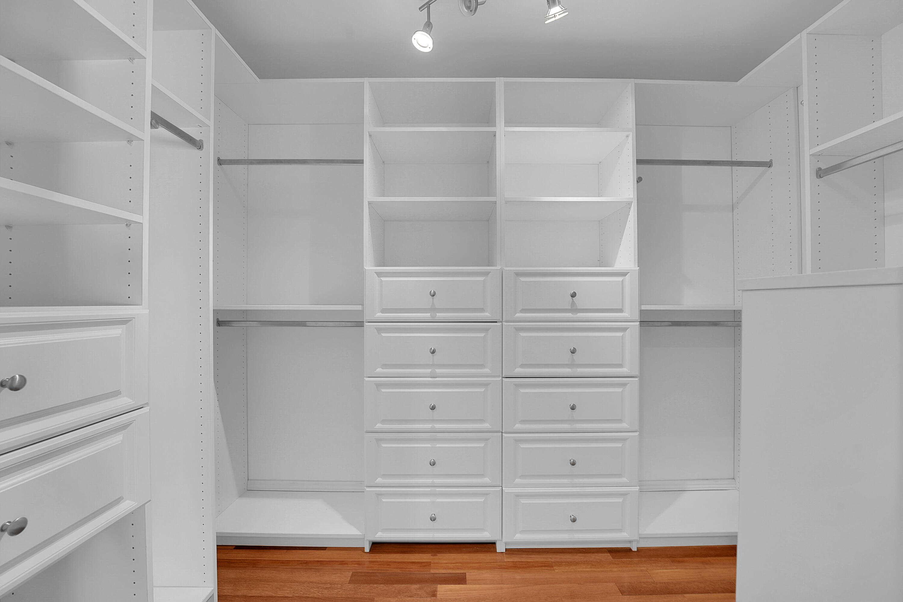 10 Middle Road Sewall's Point, FL 34996 - Photo 19 of 28 a view of walk in closet with empty racks